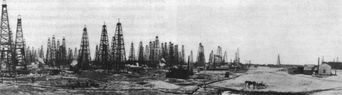 Forest of oil wells at Spindletop in the early 1900s