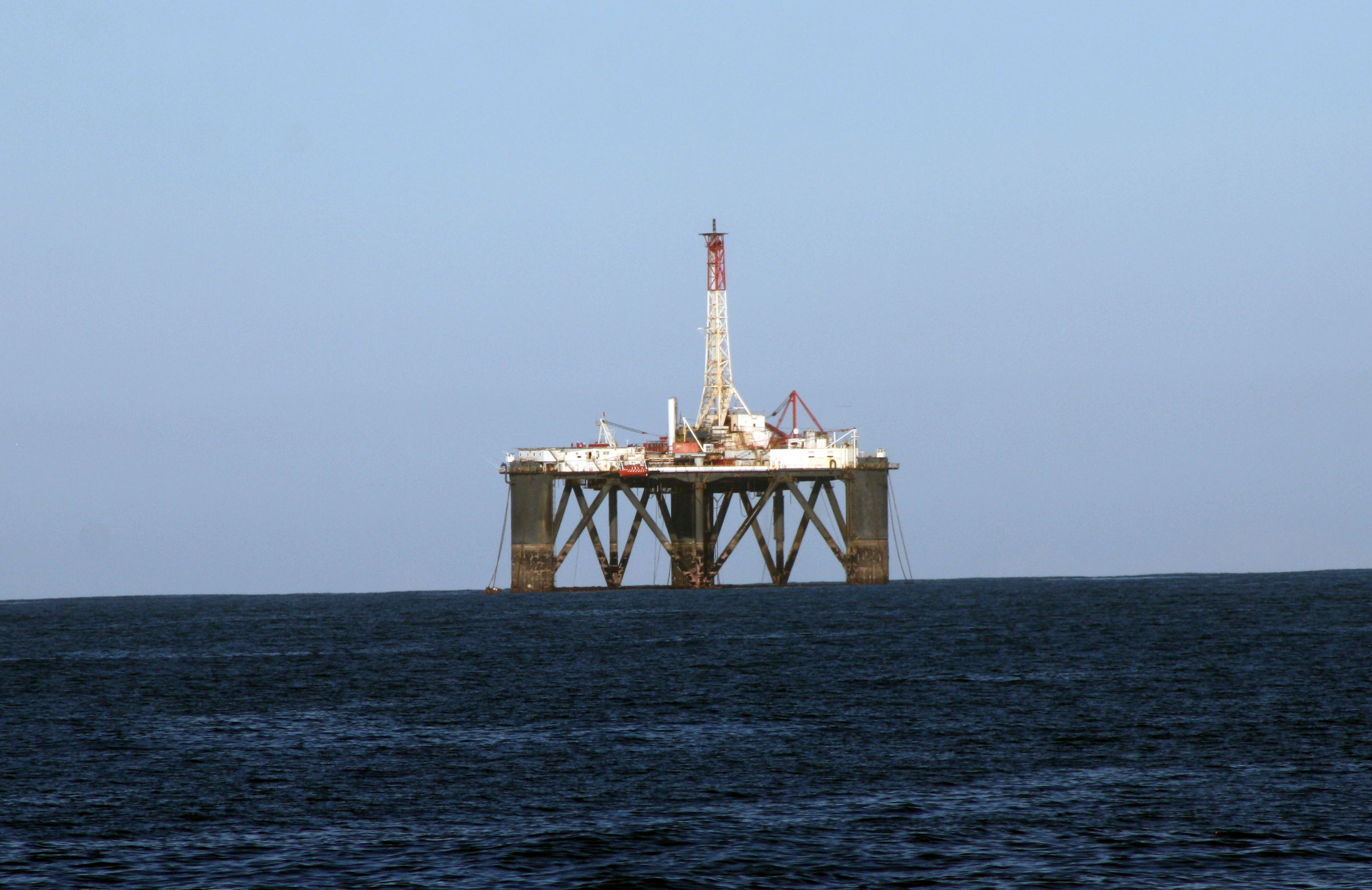 PetroSA FPSO vessel Orca moored at Mossel Bay, South Africa, with processing topsides visible on deck