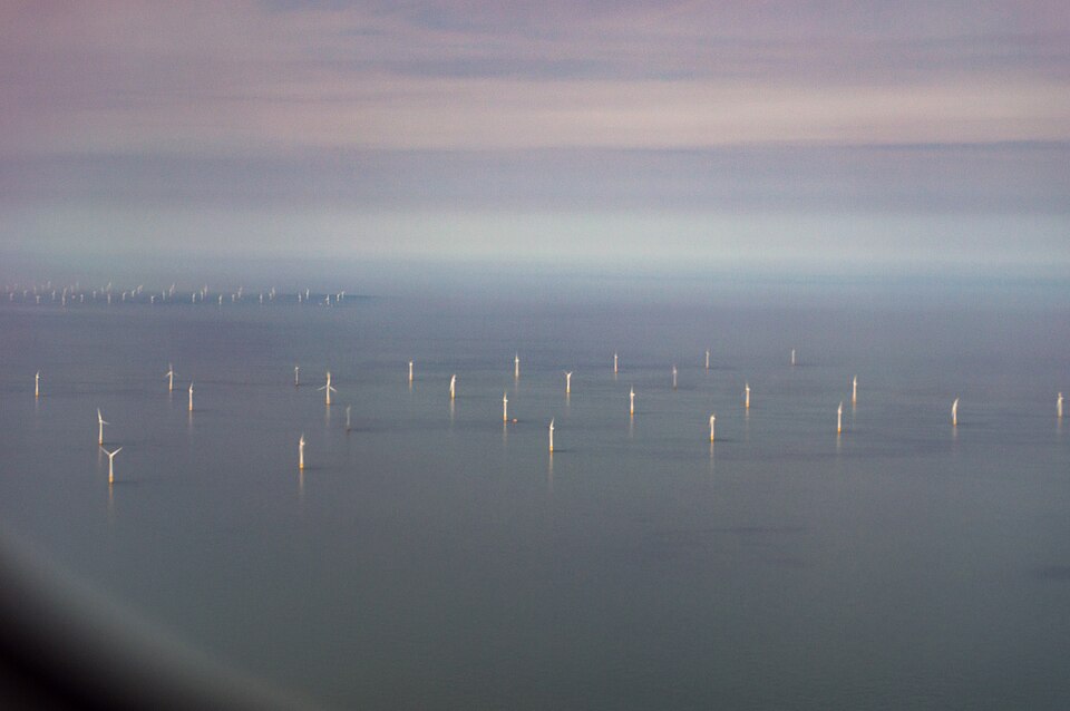 Aerial photograph of the Egmond aan Zee offshore wind farm in the North Sea off the Netherlands, with a second wind farm visible in the background